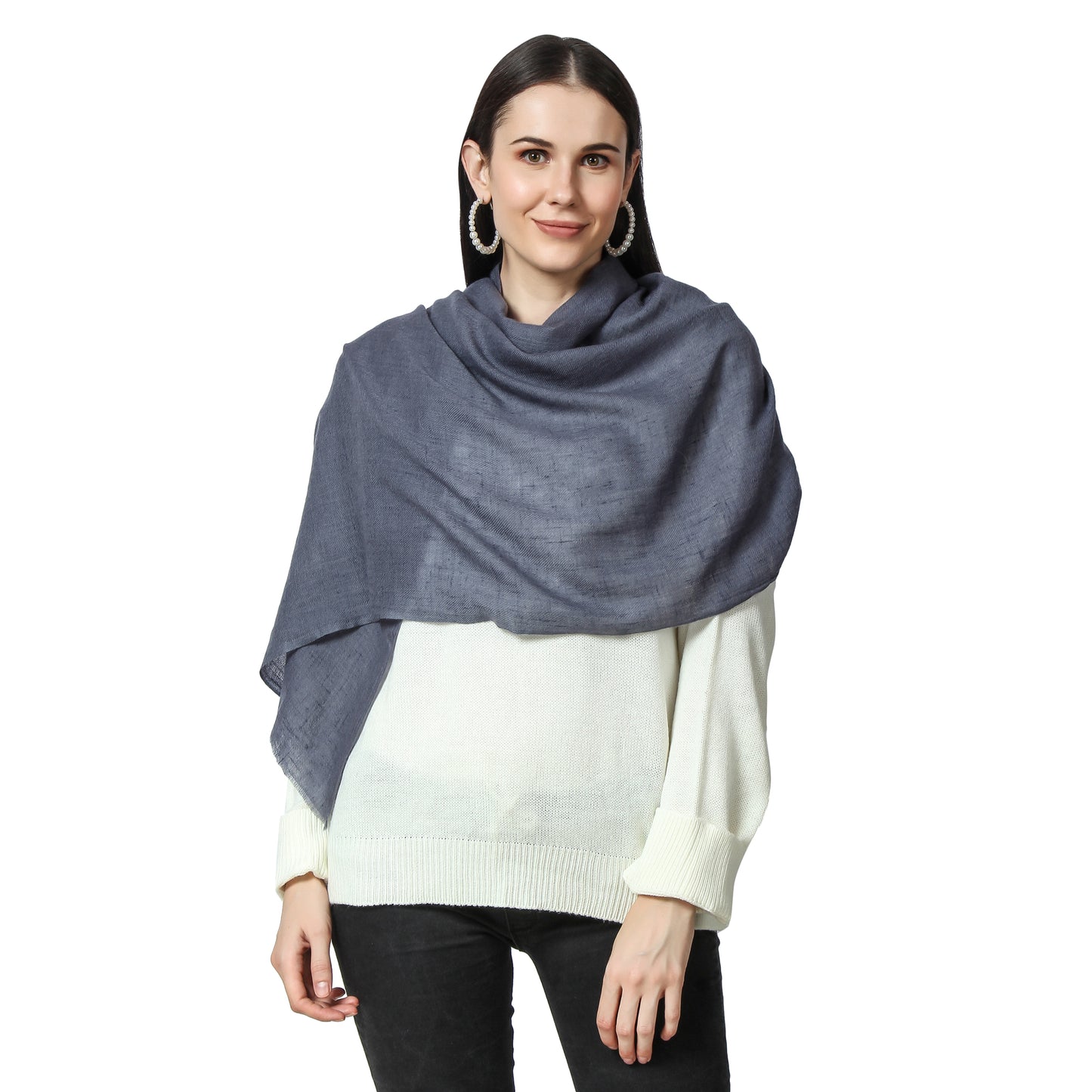 A woman wearing a Slate Cashmere Scarf on a white Sweater
