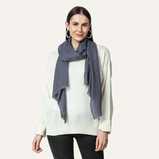 Woman wearing a gray cashmere scarf