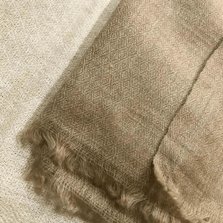 Cashmere Fabric brown color on a white color