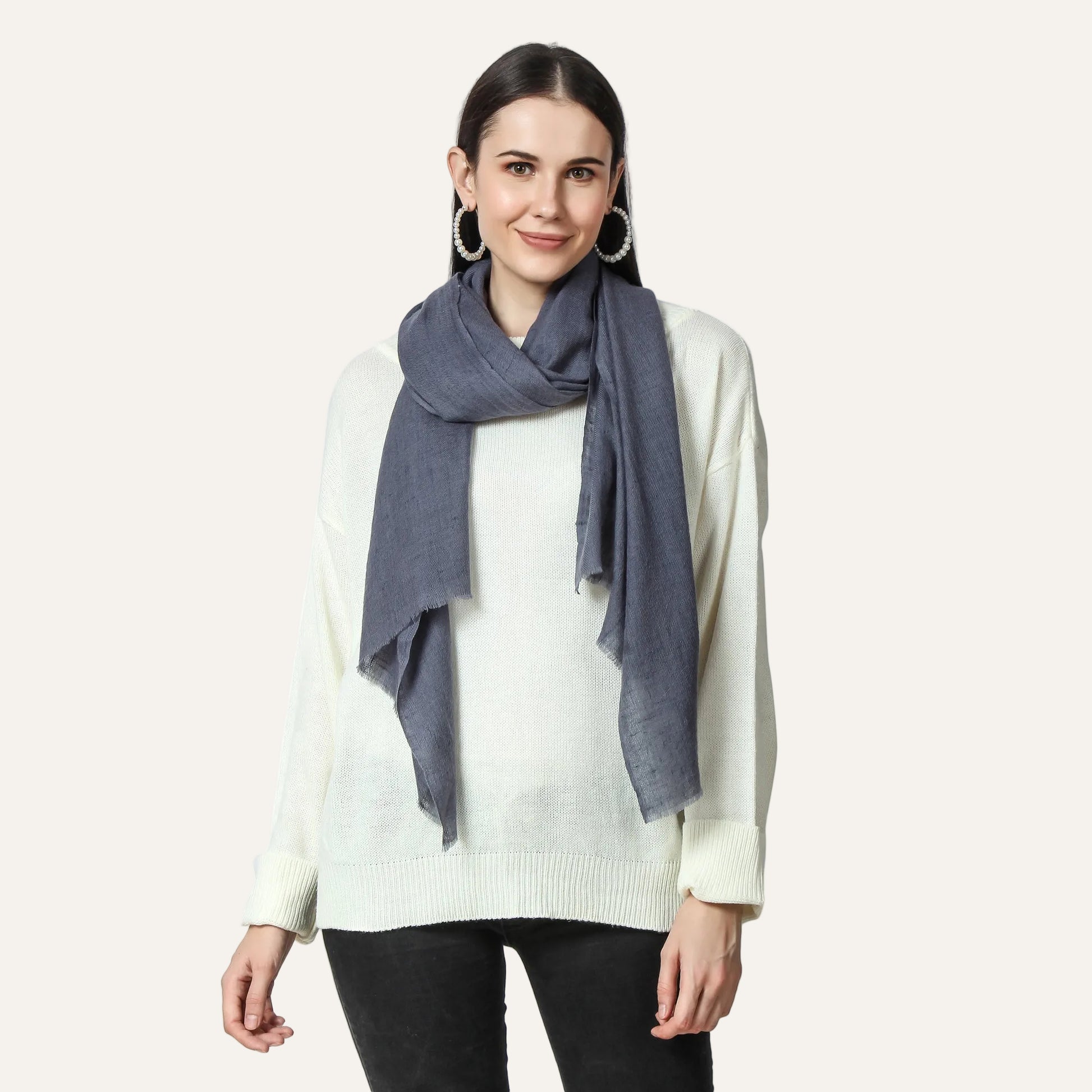 Woman wearing a gray cashmere scarf 