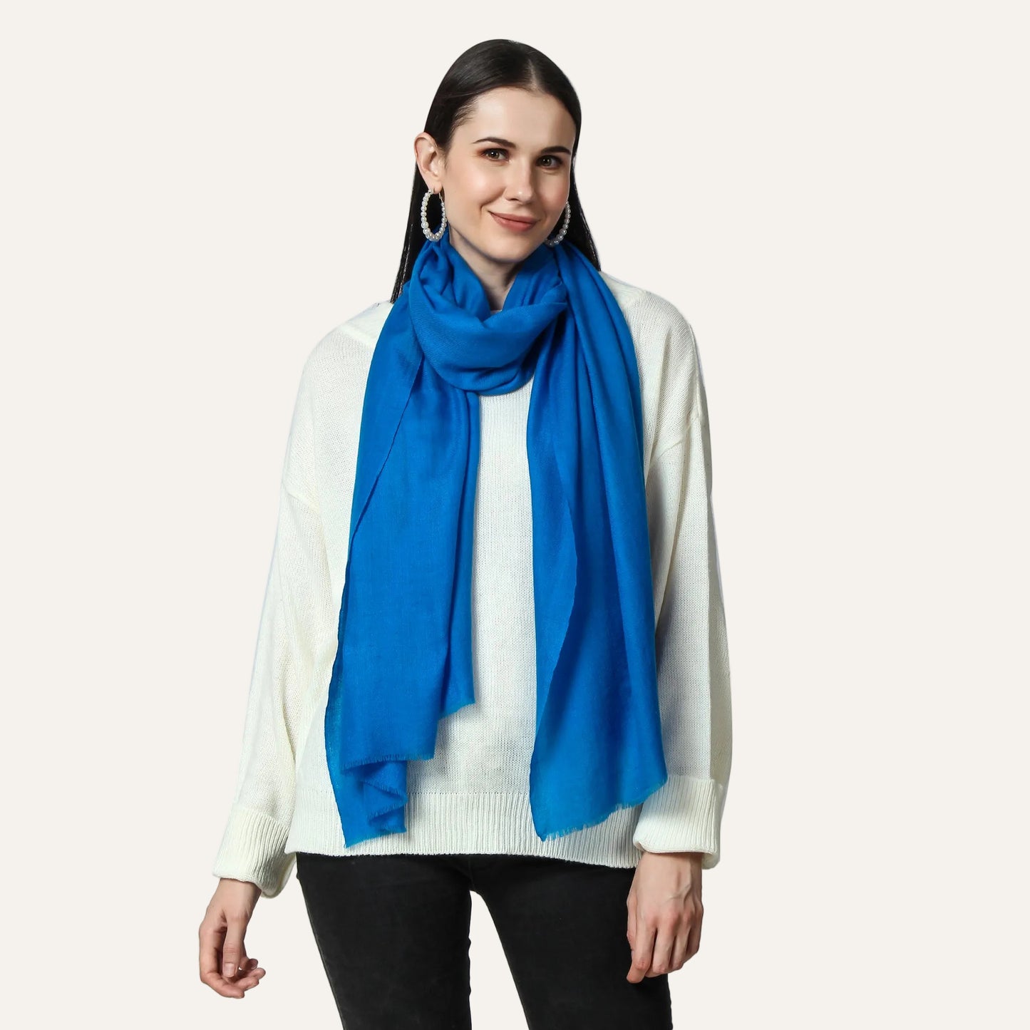 Blue color cashmere scarf worn by a lady