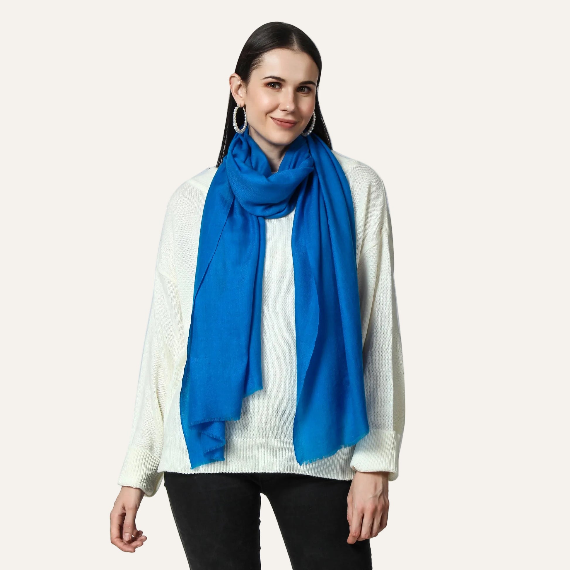 Blue color cashmere scarf worn by a lady