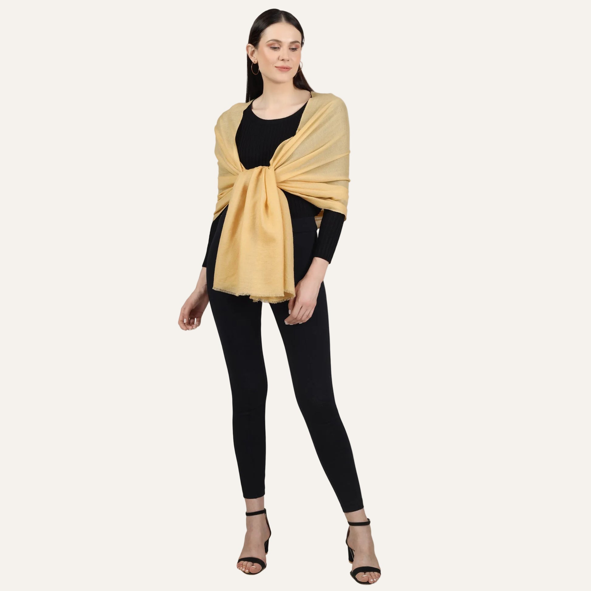 Woman wearing Yellow scarf of black dress