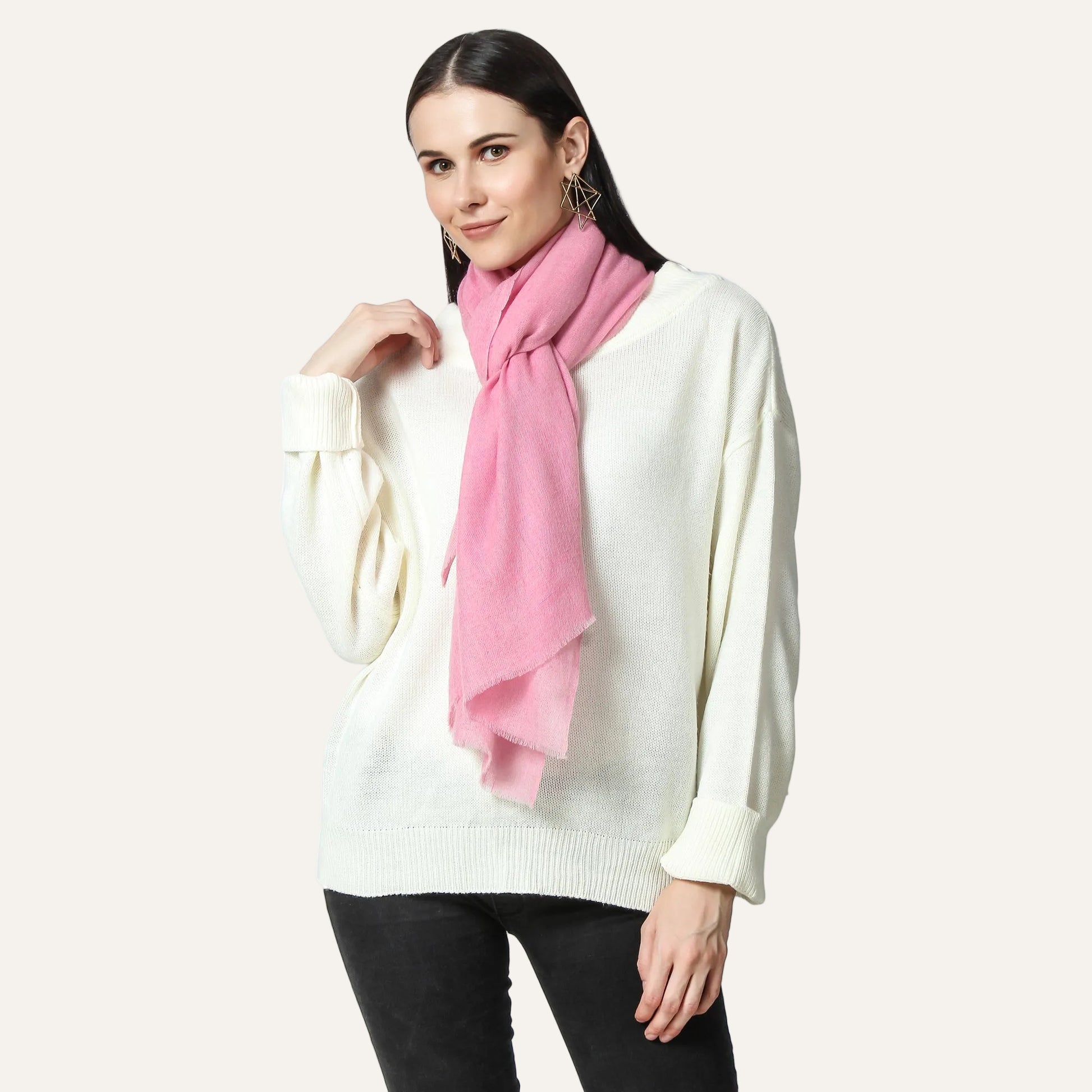 pink cashmere scarf worn by a woman 
