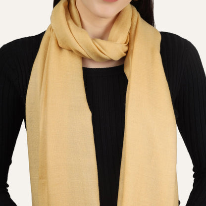 A closeup picture of yellow cashmere scarf
